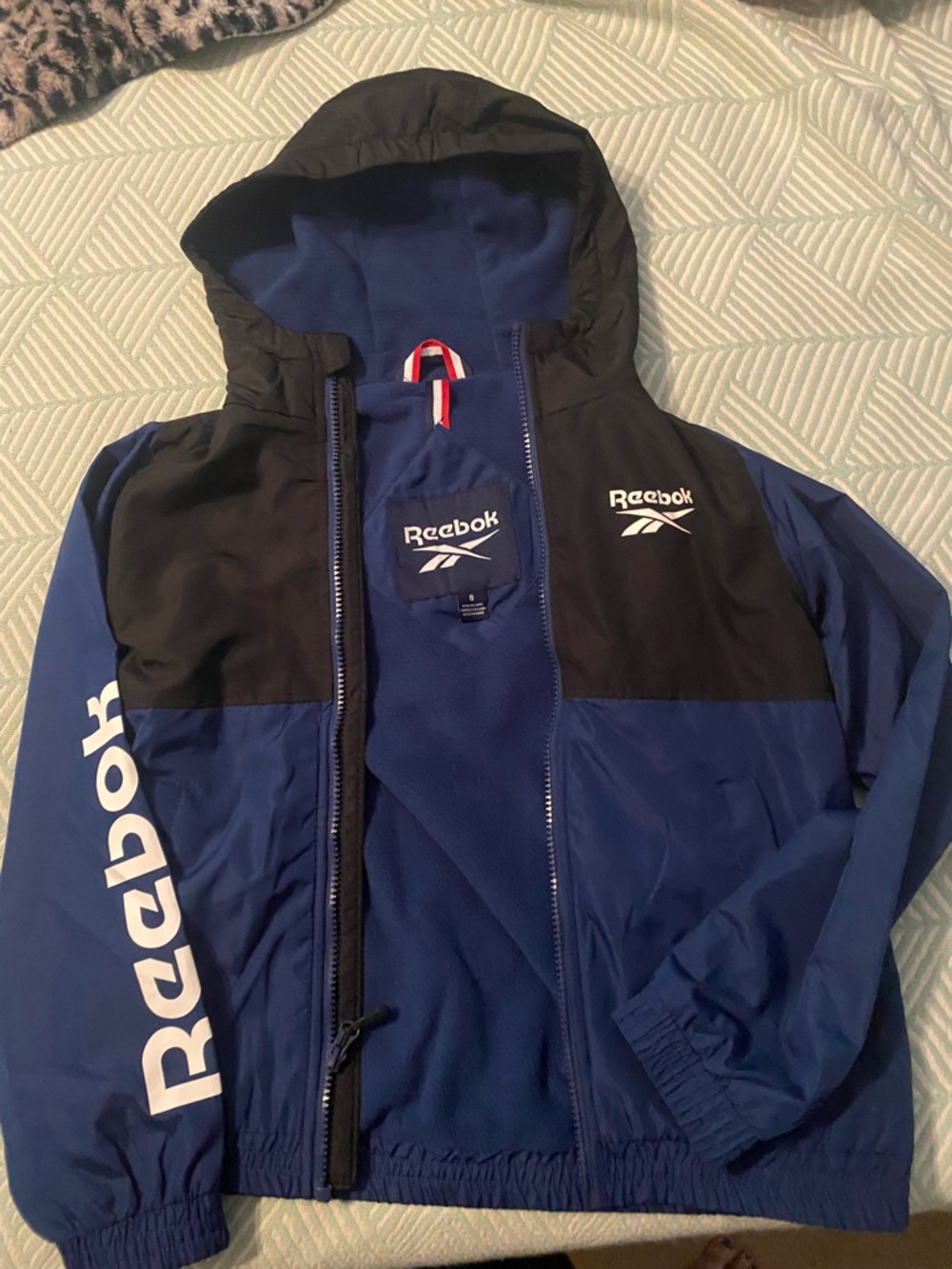 Reebok Boy’s Blue/Black Hooded Windbreaker Jacket